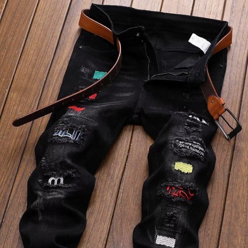 Streetwear Brand Designer - กางเกงยีนส์ขาดสไตล์สตรีทแฟชั่นเกาหลี ทรงสลิมพิมพ์ลายลำลอง ยืดหยุ่น สีดำ กางเกงยีนส์ผู้ชายแบรนด์ดีไซเนอร์